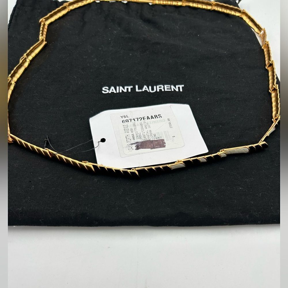 Women’s St. Laurent, gold toned necklace with alternating long and short links